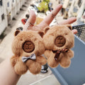 11CM Stuffed Animal Toys Bow Capybara Keychain Backpack Pendant Car Keychain Fluffy Kawaii Plush Doll Capibara Peluches Keychain