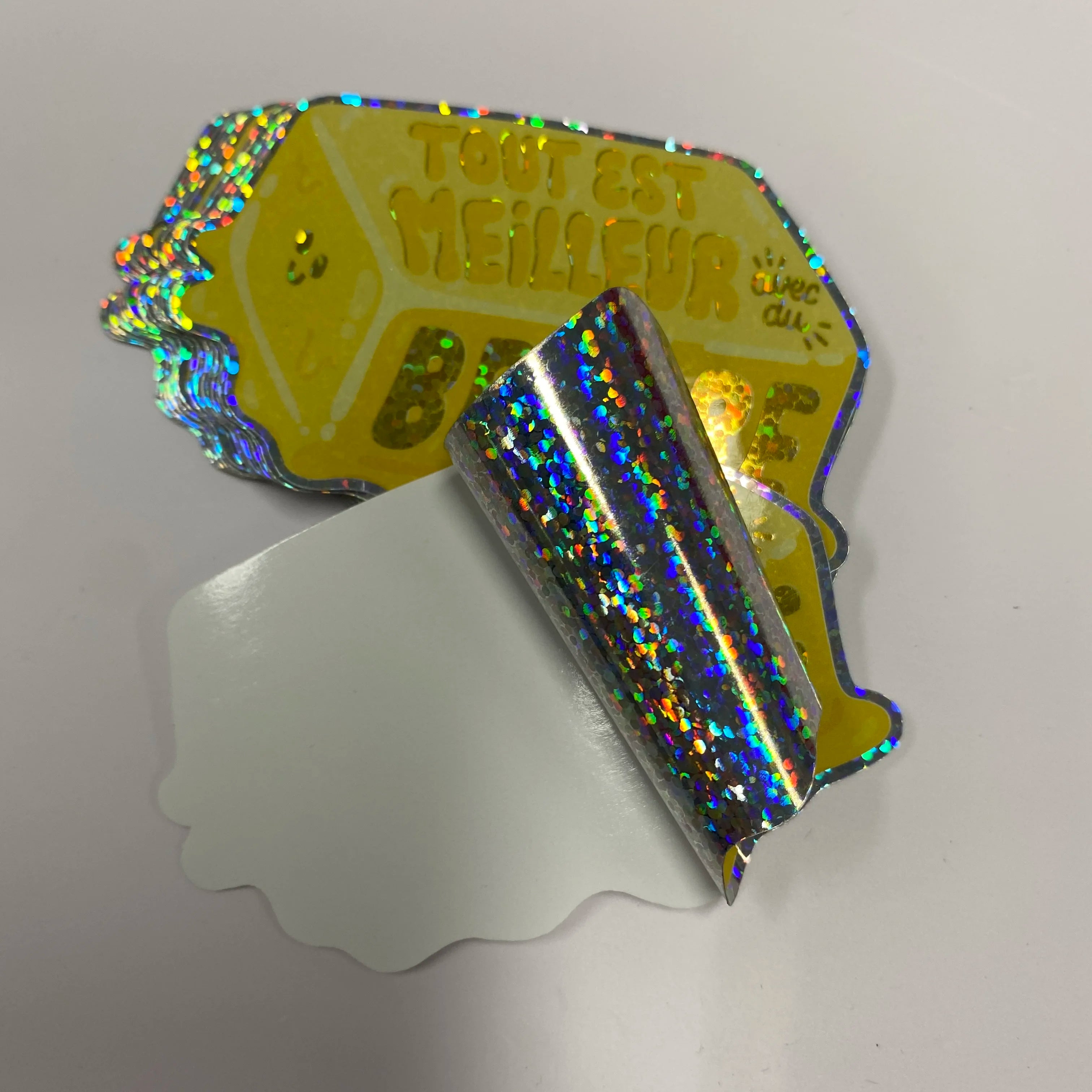 Factory Wholesale Holographic Laser Sticker Custom Roll Waterproof Glossy With Glitter Rainbow Shinny Packaging Label Printed