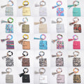 2021 Hot Sale  Silicone Wristlet Tassel Bracelet Keychain Wallet Card Holder Personalized Enamel Disc Leather Round Keycha