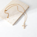 Fashion Statement Stainless Steel Gold Plated Elegant Pearl Inlaid Cross Necklace for Women Ladies