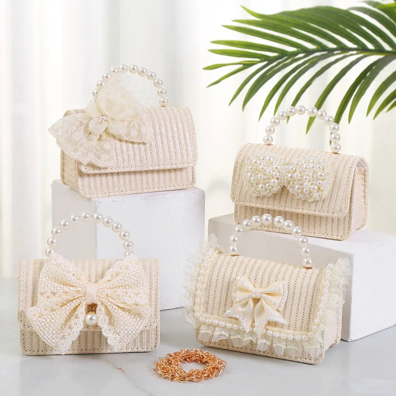 SW Hot Sale White Bow Knot Lady Shoulder Bag Hand Straw Woven Tote Imitation Pearl Zipper Closure High Quality Lining for Winter