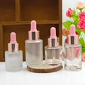 Empty Clear Frosted 1 oz 1oz 30 ml 30ml Flat Shoulder Cylinder Glass Dropper Bottle for Serum Essential Oil with Pink Dropper