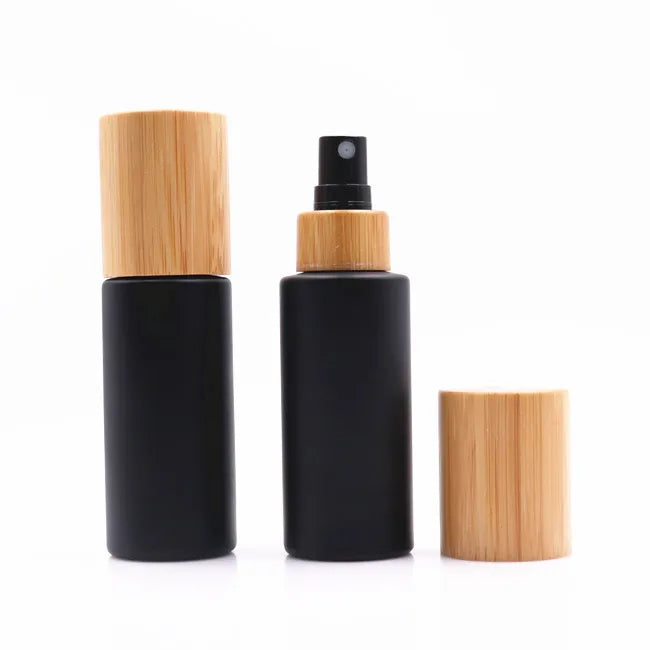 Empty 30 ml 50ml Cosmetic Cuticle Hair Essential Oil Bottles Frosted Black Glass Spray Bottle with Bamboo Lid Top