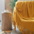 Wholesale Custom Sofa Home Decor Plain Soft Lightweight Elasticity Breathe Acrylic Knitted Throw Blanket With Tassel