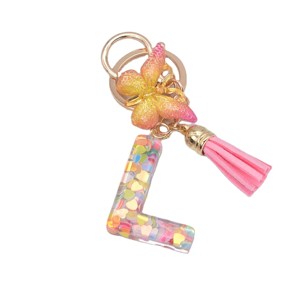 New Trendy 2024 Manufacturer Glitter Resin Initial Alphabet Letter Pendant Keychain With Tassel for Women and Girls