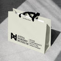 Best Selling Chinese Manufacturer Wholesale Custom Design Printed Logo Gift Packing Paper Bag with Handles Shopping Bag