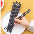 2026 Good Quality Dishwasher Safe Customized Metal Gold and Silver Banner Sets Fiberglass Chopsticks 24cm