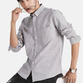 S-4XL New Non Ironing Men's Shirt Fashion and Casual Versatile Cotton Oxford Spinning Long Sleeved Shirt