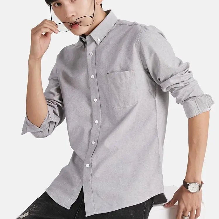S-4XL New Non Ironing Men's Shirt Fashion and Casual Versatile Cotton Oxford Spinning Long Sleeved Shirt