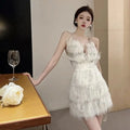 Women's Spicy Girl Deep V-neck Open Back Feather Spliced Large Swing Strap Dress