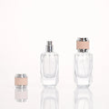 Luxury 100pcs Minimum Order Elegant 30ml/50ml Irregular Clear Glass Perfume Oil Bottle Pump Sprayer Cap Carton Box OEM/ODM