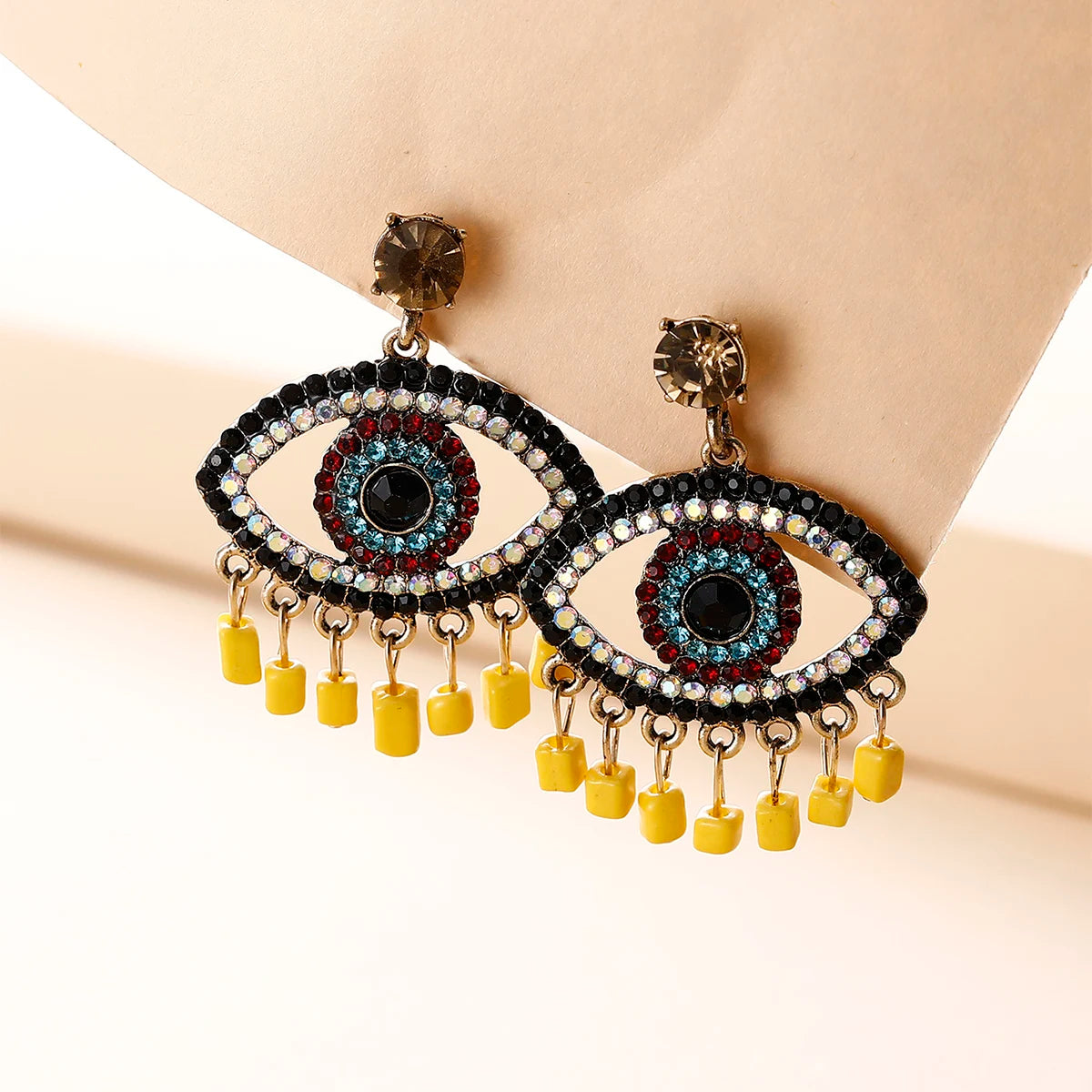 Trendy Gold Plated Acrylic Tassel Eye Drop Earrings Hollow Statement Rhinestone Evil Eyes Studs for Women for Weddings