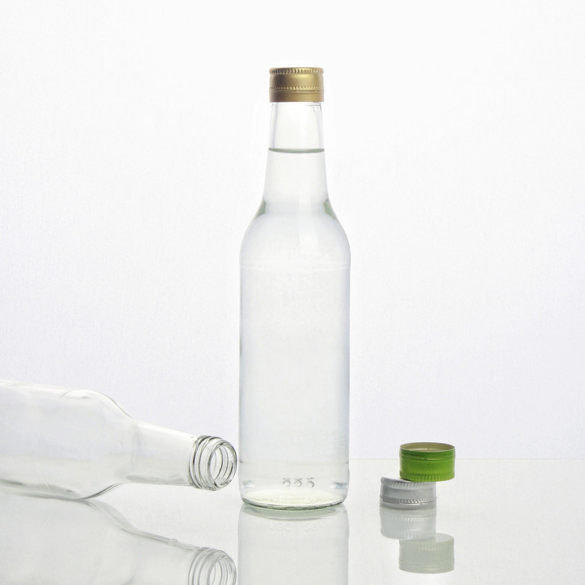In Stock Wholesale 330ml Cork Sealed Mineral Water Glass Bottles for Brandy Tequila Energy Drinks