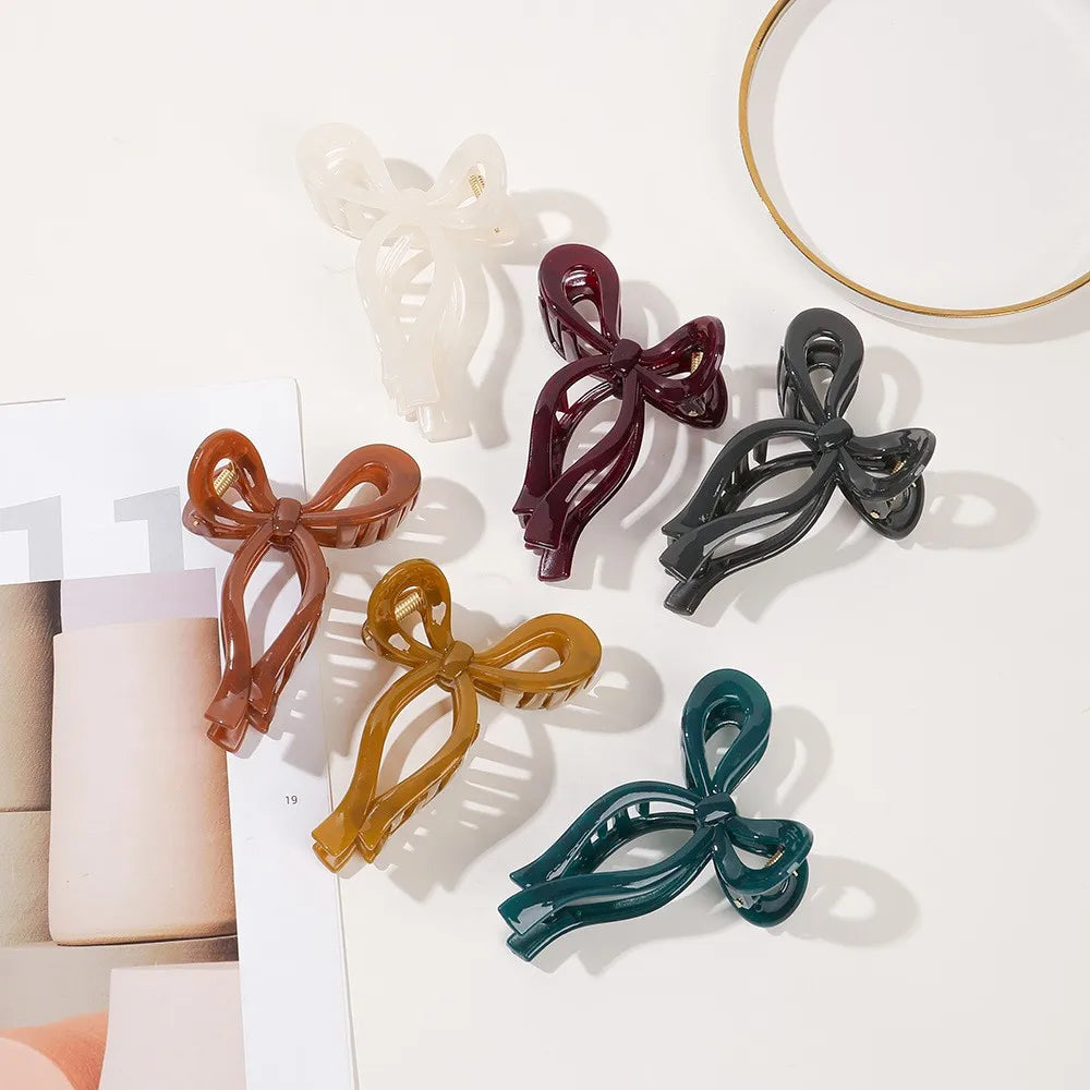 Wholesale Creative Sweet Caramel Jelly Color Bowknot Plastic Hair Claw for Gentle Women