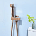 High Quality Modern Hotel Use Brass Wall-Mounted Vertical Spray Bathroom Bidet Sprayer Set Rose Gold Handheld Toilet Sprayer