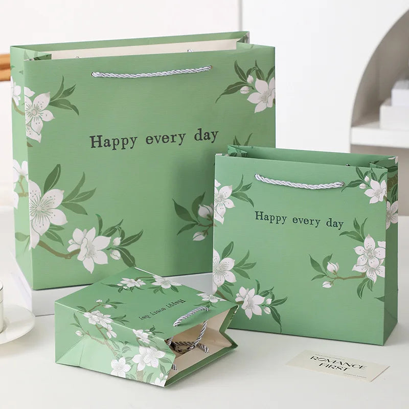 Luxury Eco-Friendly Green Color Paper Gift Bags With Delicate Floral Design
