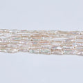 2023 Hot Wholesale Natural Read White Long Through Drilled Freshwater Pearl Biwa Beads AAAA Grade 20mm