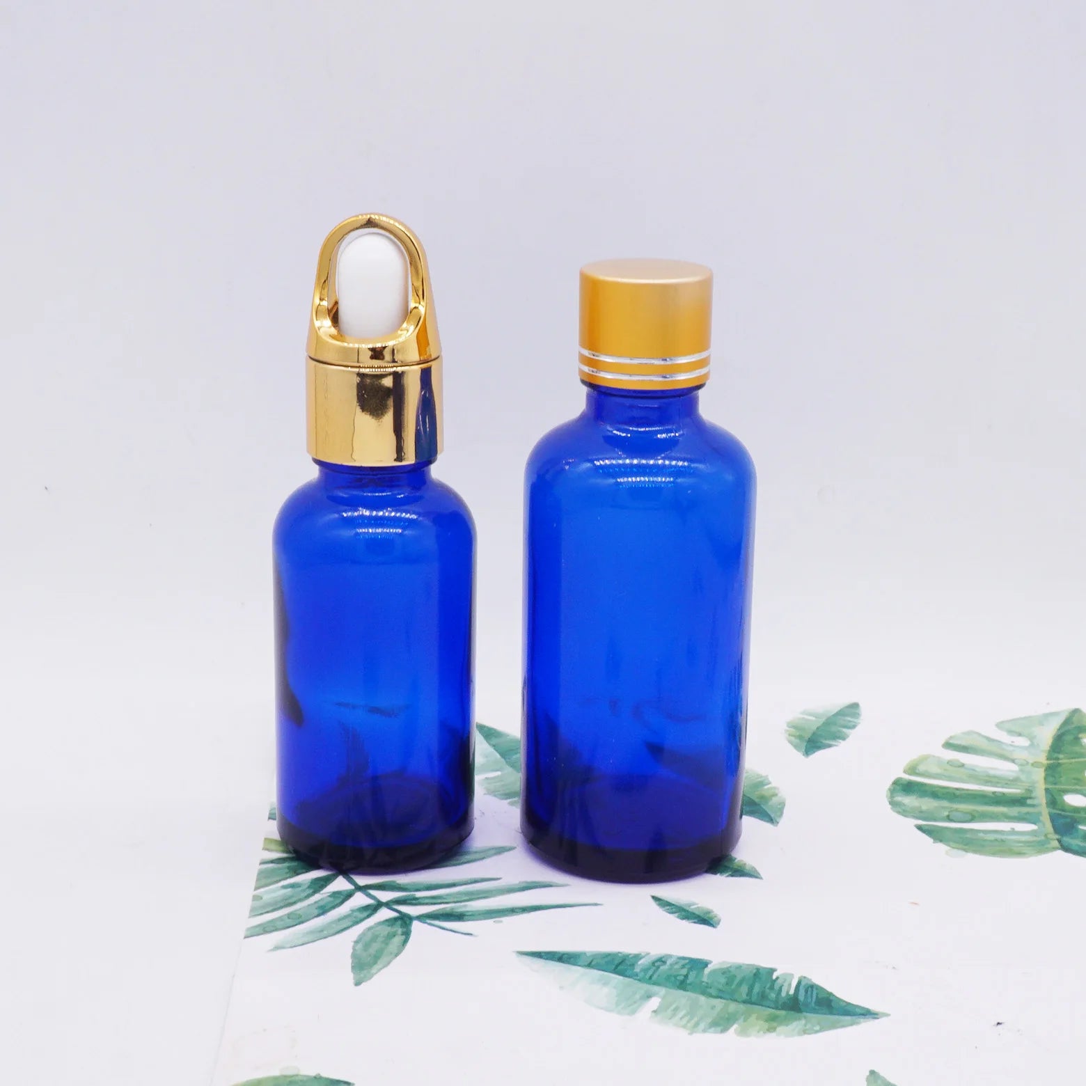 1oz Cobalt Blue 20ml Glass Serum Bottle with Gold Dropper Lid