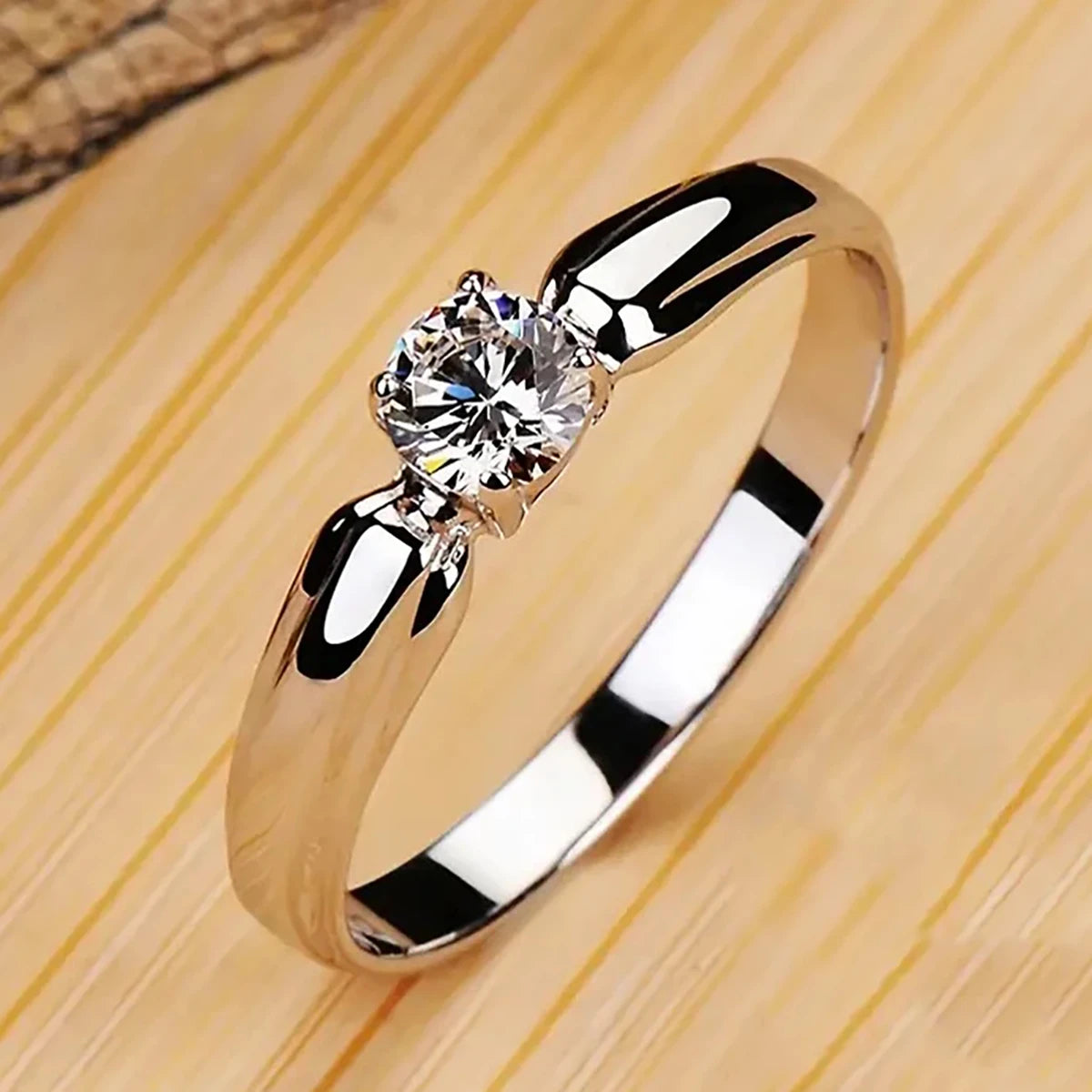 Huitan S925 Hot Sale Custom Simple Style 4 Claws Imitated Diamond Finger Band Ring for Engagement Ring 925 Sterling Silver Women
