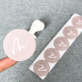 Custom Logo Sticker Label Printing Waterproof Roll Synthetic Paper Adhesive Round Gold Logo Sticker for Envelope Box Packaging