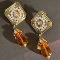 2023 New Arrival Fashion Jewelry Medieval Vintage Diamond Shaped Metal Orange Water Drop Glass Resin Statement Drop Earrings