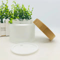 1oz 2oz 4oz 6oz 8oz 4 oz 150g 200g Cosmetic Clear Frosted Glass Cosmetic Eye Lotion Cream Jar 200g 100ml 250ml with Bamboo Lid
