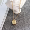 Chris April Fashion Jewelry PVD Gold Plated 316L Stainless Steel Cube Eight-pointed Star Pendant Necklace with Zircon