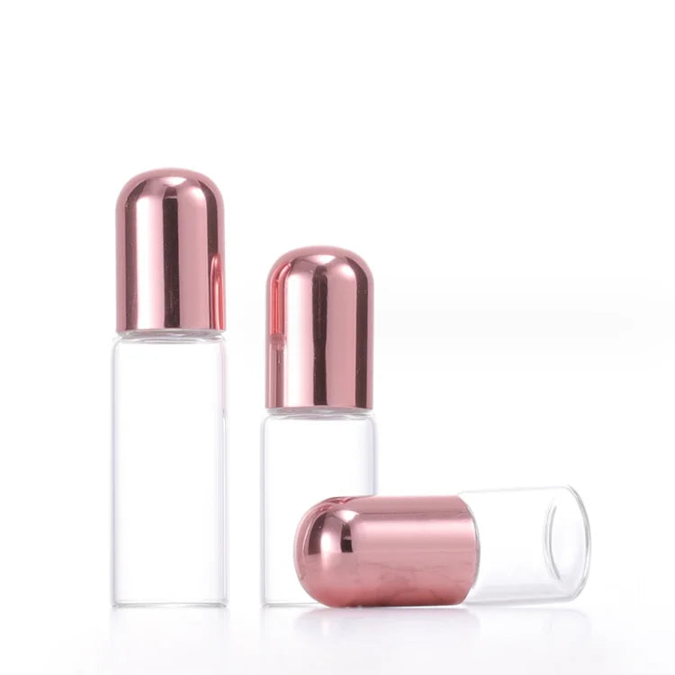 Wholesale Stock pink Aluminum Lid Essential Oil Bottle 1ml 2ml 3ml 5ml Rose Gold Glass Roller Cosmetic Packaging