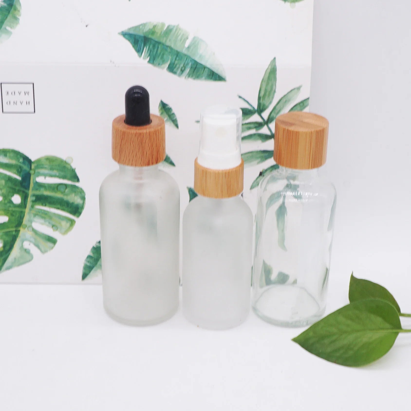 Eco Friendly Cosmetic Push Button Serum Bottle 30ml 50ml 100ml with Bamboo Lid