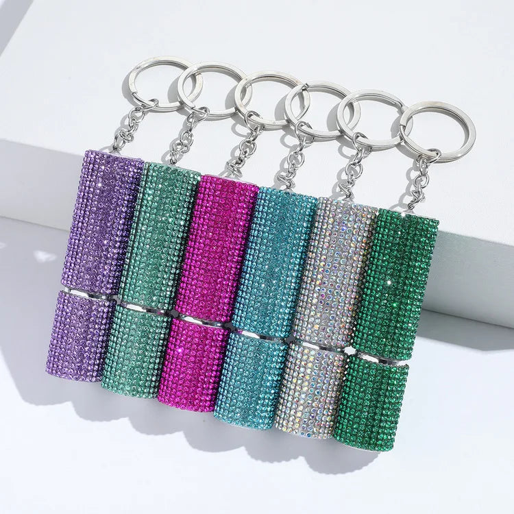 Wholesale Self Defense Perfume Bottle 5ml Portable High End Alloy Push Sample Bottle Spray Drill Perfume Bottle with Key Chain