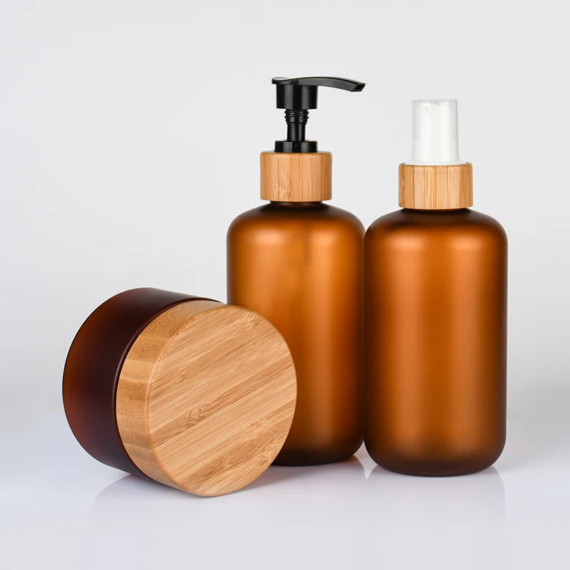 Wholesale Bamboo Cosmetic Packaging 15g 30g 50g 100g 150g 200g 250g Frosted Amber PET Plastic Jar with Bamboo Cap