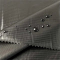 100% Nylon 40D 240T Black Yarn Ribstop Taffeta Shiny Calendering for Down Proof Jackets Wears Fabric Customizable