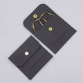 PUPPYSEW Dark Grey Microfiber Jewelry Pouch Bag Jewelry Snap Button Bags With  Necklace Bracelet  Pouch Bag With Logo Custom