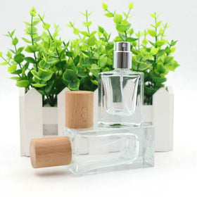 Wholesale 30ml 50ml Clear Square Glass Perfume Bottle New Empty Oil Perfume Atomizer Spray Wooden Lid Screen Printing Surface