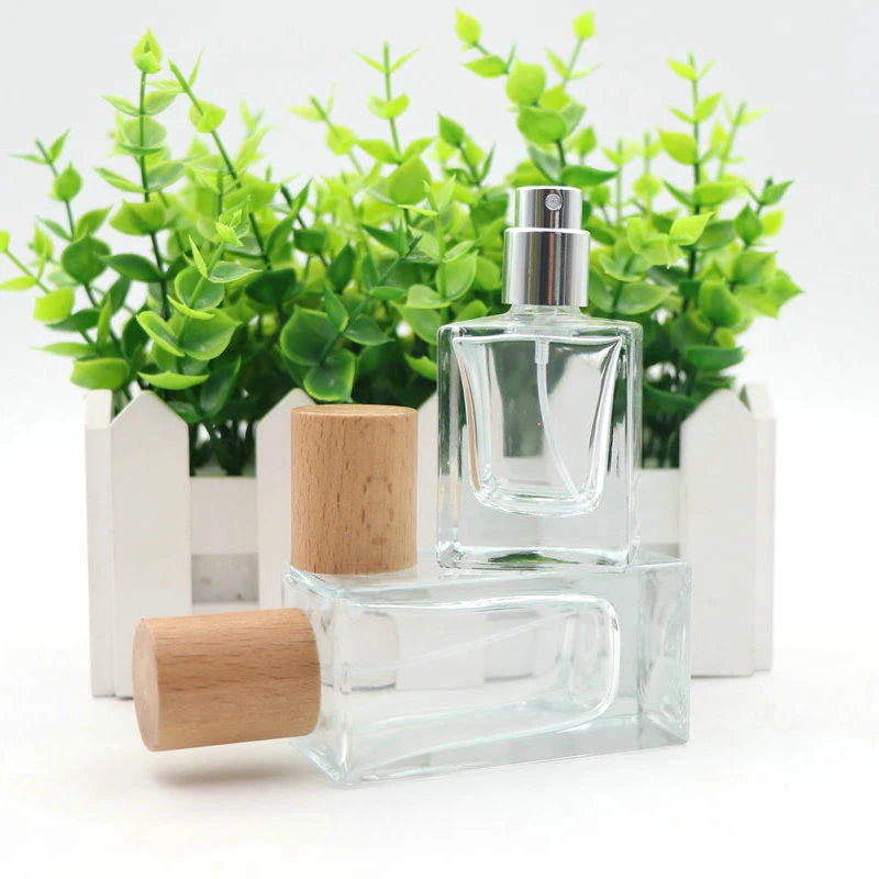 Wholesale 30ml 50ml Clear Square Glass Perfume Bottle New Empty Oil Perfume Atomizer Spray Wooden Lid Screen Printing Surface