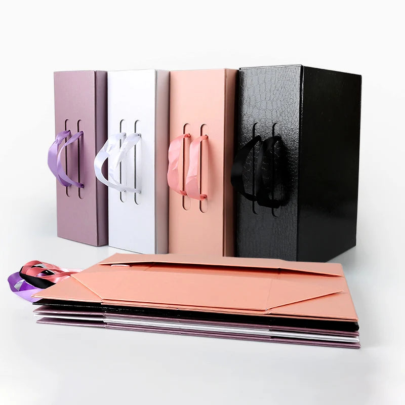 Ready to Ship Colorful Rigid Paper Cardboard Gift Packaging Magnetic Folding Box With Ribbon Handle