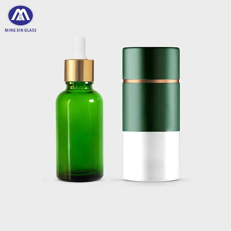 Factory Price 30Ml Clear Green Glass Essential Oil Dropper Serum Bottle with Pump Sprayer and Box