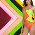 Jdttex Stock Lot Nylon Spandex 4 Way Stretch Spandex Fabric for Swimwear Swimsuit