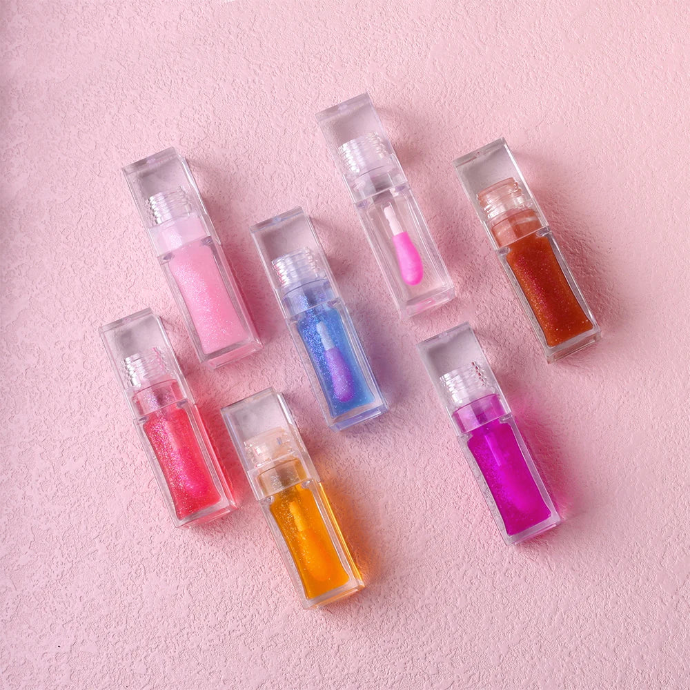 Hot Selling Fruit Lip Plumper Oil Private Label 7 Colors Vegan Color Changing Lip Gloss Beauty Cosmetics Lip Oil