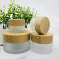 Luxury Cosmetic Packaging 30g 50g 100g 150g 200g 250g Eco-friendly Empty Frosted Glass Jars with Bamboo Wooden Lids