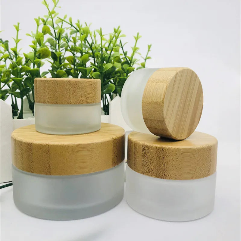 Luxury Cosmetic Packaging 30g 50g 100g 150g 200g 250g Eco-friendly Empty Frosted Glass Jars with Bamboo Wooden Lids