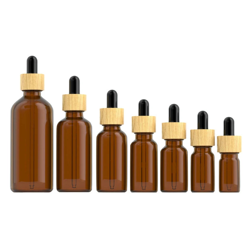 Custom Amber 5ml 10ml 20ml 30ml 50ml 100ml Glass Essential Oil Bottle With Dropper and Bamboo Cap