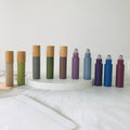 Wholesale 10ml Morandi Color Scheme Matte Metal Roller Glass Bottle with Real Bamboo Cap and Stainless Steel Roller