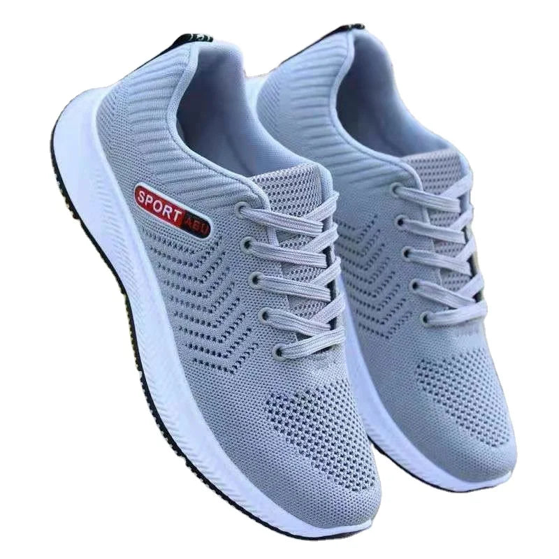 The Latest Models of Fly Weaving Mesh Shoes Spring and Summer Fall Trend Sneakers Men Easy to Match Casual Shoes Running Shoes