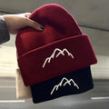 2025 Autumn Winter Women's Fashionable Cold-Proof Knitted Hat With Pompom Solid Color Designer Cotton Skull Pattern