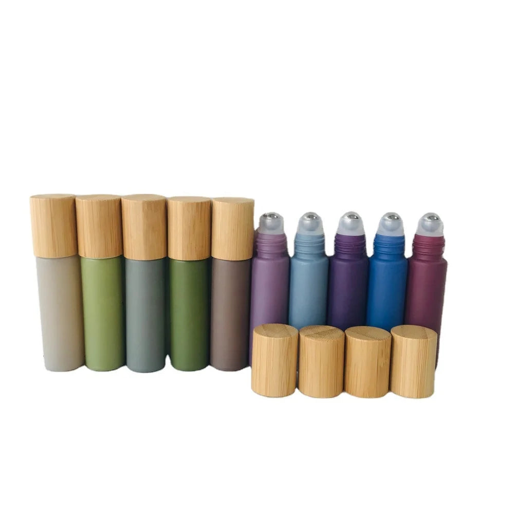 Wholesale 10ml Morandi Matte Colored Metal Roll-on Glass Bottles Thick Wall with Real Bamboo Cap Cylindrical Shape