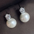 Huitan Dainty Round Sparkling Zircon Imitated Pearl Silver Plated Stud Earring for Women Wedding Engagement Earrings Jewelry OEM