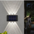 Hot Sale IP65 Waterproof Polysilicon Solar Panel White Light Warm Light up and Down Light Source Solar LED Wall Lamp Hotel