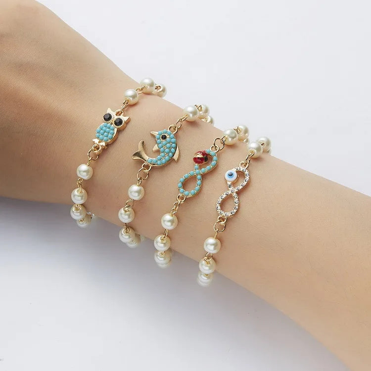 DS Wholesale Fashion Cross 8-shaped Round Pearl Bracelet Multi Design Adjustable Bracelet