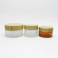 Support Customized LOGO Body Butter Round Uv 2oz 50ml 100g Glass Cream Jar with Bamboo Lid for Cosmetics
